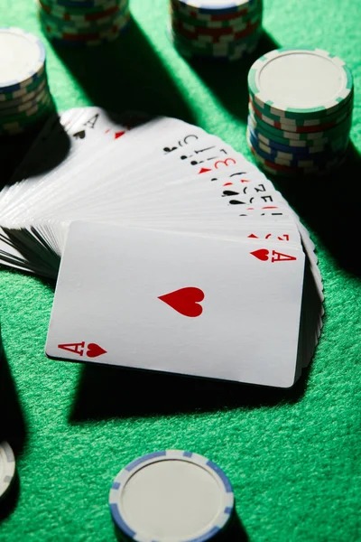 Live Capsa Banting table with dealer and player cards displayed